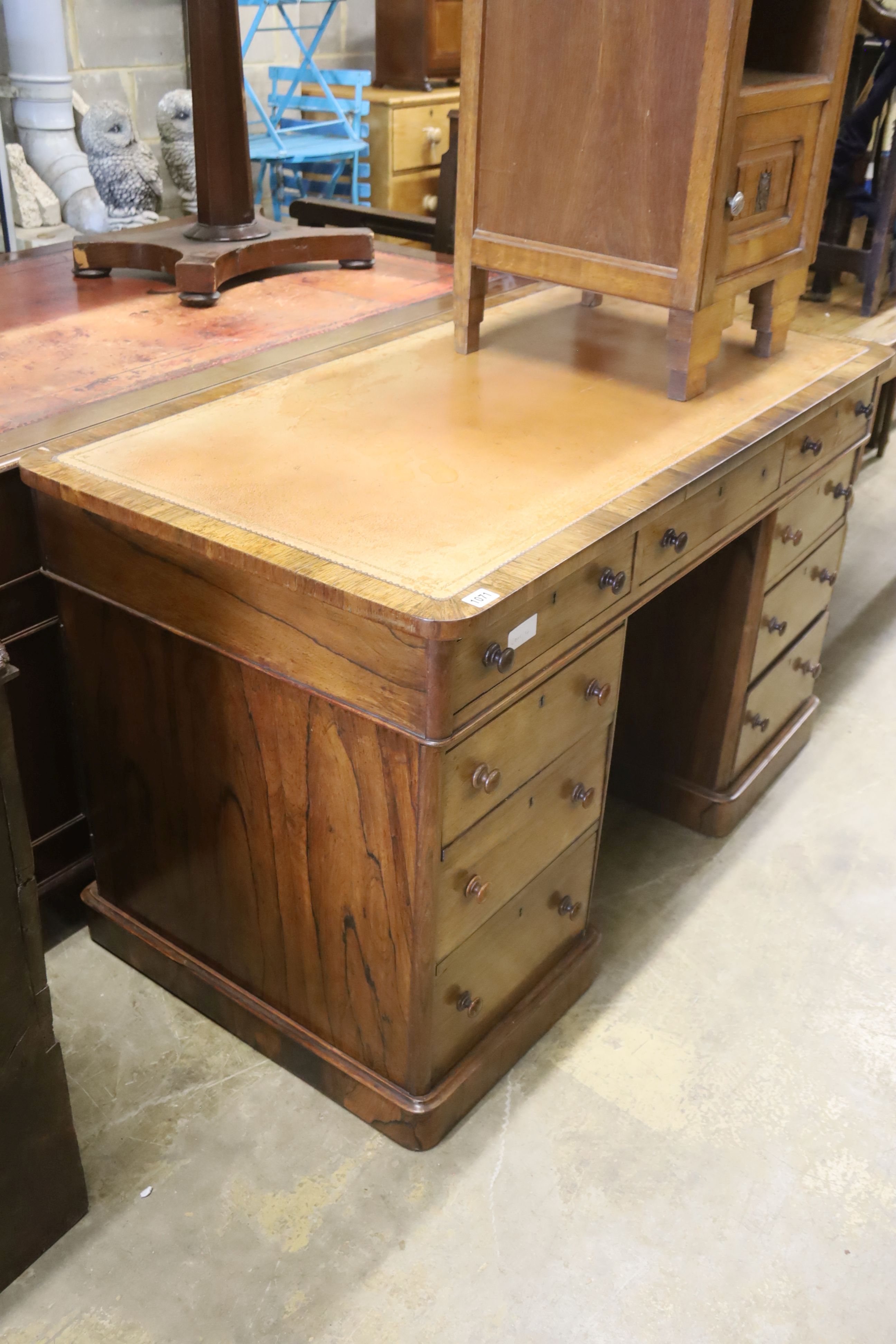 A Victorian rosewood pedestal desk, length 122cm, depth 54cm, height 74cm